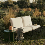FermLiving_SS25_Desert2-Seater_PureBoucle_Black_Off-white_1104270930_DeyaSideTable_47_DarkGreen_1104270815_LuverPortableLamp_Natural_1104271033_PilaLinenThrow_BlackElmGreen_1104270970.jpg