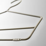inspiration-string-system-coat-hanger-beige-white-upclose_portrait_medium.jpg