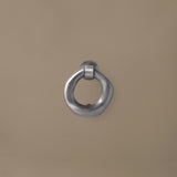 FermLiving_SS26_PackshotsWithBackground_OrrithDoorKnocker_BrushedAluminium_1104273179.jpg