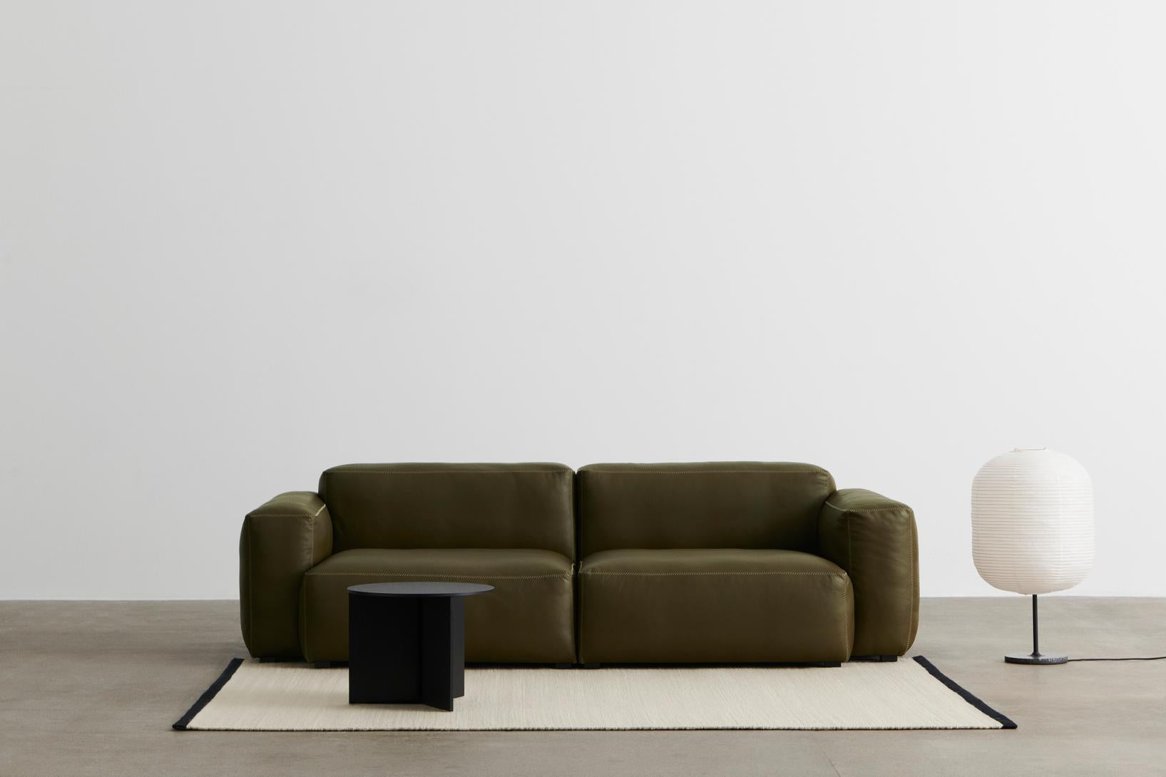 Mags Soft Low 2,5 Seater comb 1 Sense forest and beige stitches_Slit Table Round black_Common Table lamp base soft black steel stem and black terrazzo base and Oblong shade.jpg