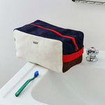Multi-Wash-Bag-Cream-multi_Tann-toothbrush-Pine-green-and-blue.jpg