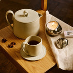 FermLiving_Holiday2026_BellureScentedCandle_1104273902_FlowTeaPot_1104271934_FlowMugwithSaucer_1104271929_BodaDiningChair_1104272938.jpg