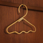 FermLiving_AW25_WaviClothesHangers_SetOf3_Natural_1104272112.jpg