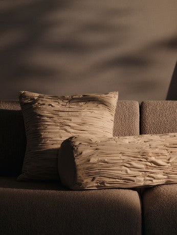FermLiving_AW25_RicoCenterSoftBouclé_Natural_1104272256_1104272553_1104272554_FaldaSmockedCushion_Undyed_1104272242_FaldaSmockedBolsterCushion_Undyed_1104272241.jpg