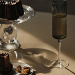 FermLiving_Holiday2025_RippleChampagneFlutes_SetOf2_SmokedGrey_1104271424_DamoGlassCentrepiece_21_Clear_1104272103 (1).jpg