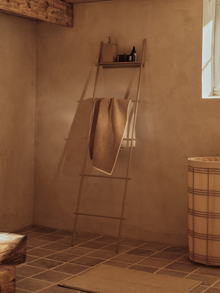 FermLiving_SS26_DoraTowelLadder_1104272536_SamaSoapDispenser_1104272530_FioLaundryBasket_1104273166_EkkoBathTowel_1104272799.jpg
