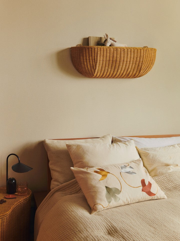 FermLiving_AW25_DonkeySoftToy_UndyedDarkSand_1104269784_BraidedWallPocket_75x25_Natural_1104271936_SwifBirdEmbroideredCushion_Rectangular_Multi_1104272027_WilloraBraidedStorage_SetOf2_Natural_1104272032.jpg