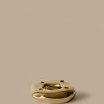 FermLiving_Holiday2026_PackshotsWithBackground_BellureRingCandleHolder_BrassFinish_1104273900.jpg