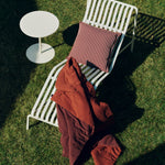 Palissade Chaise Longue cream white_Terrazza Cushion terracotta bold stripe_Air Quilt iron red.jpg