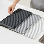 JJ_Tier-Expandable-Draining-Mat_Grey_85178_IU2_07e1b33d-a26c-4e06-a29b-a41561a6e3b6_2000x.jpg