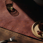 FermLiving_Holiday2025_BaiesTableRunner_DarkGrapePicanteRed_1104272156_BoyaLowGlasses_SetOf2_SmokedGrey_1104272028_SteloCutlery_SetOf4_BrushedStainlessSteel_1104272000.jpg