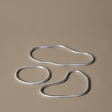 FermLiving_SS26_PackshotsWithBackground_PondTrivetsSetOf3_Aluminium_1104272892.jpg