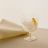 Curve Stem Glass clear_Tavolo Placemat soft yellow.jpg