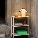 Arcs-Trolley-High-eggshell_Ava-Pyramid-Table-Lamp_Colour-Storage-vibrant-green_Indian-Steel-Pitcher-Tall.jpg