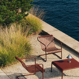 Palissade Cantilever Lounge Chair Low_Palissade Low Table iron red_Mousqueton Portable brushed stainless steel.jpg