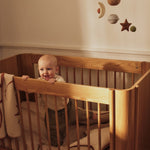 FermLiving_SS26_SkyeMobile_1104273156_TiluBabyCot_1104273074_SkyeBlanket_1104273046_StarCushion_1104273196 (1).jpg