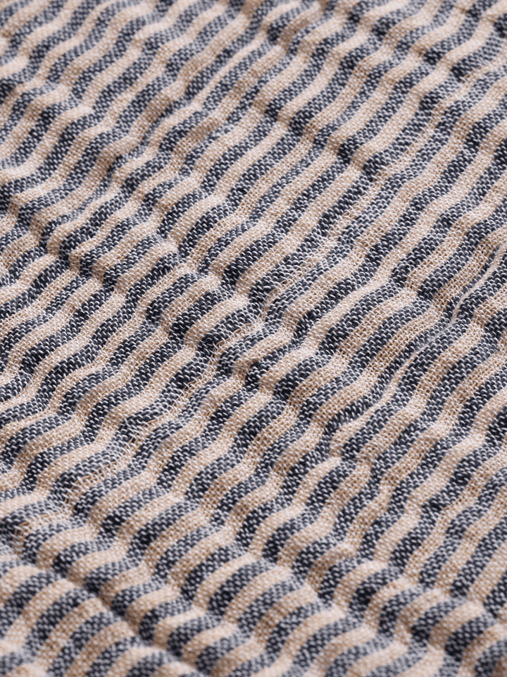 FermLiving_SS25_FinoBedspread_InkBlueSand_1104270925_2.png