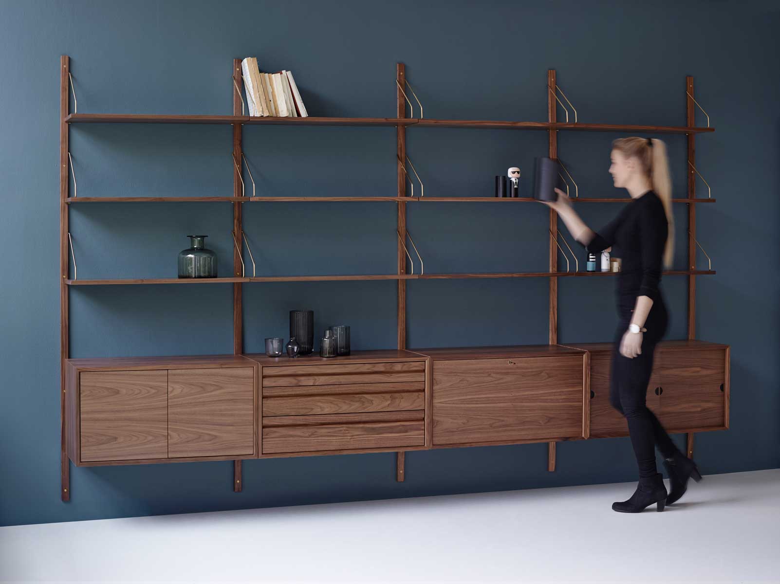 RS_BLUE-BACKGROUND_FROM-SIDE_WALNUT_STYLED_PERSON-(1).jpg