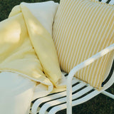 Air Quilt soft yellow_Terrazza Cushion Bold Stripe yellow_Palissade Cantilever Dining Armchair cream white.jpg