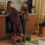 FermLiving_AW25_PodoStool_RedBrown_1104268964_Khaki_1104268965_TukkiTrolley_Natural_1104272297_TiltRug_140x200_ElmGreen_1104272087.jpg
