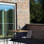 2024_Vig_Chairs_Black_Vig_Table_90x80cm_Robinia_Black_Pipe_Pitcher.jpg