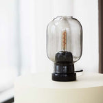 502120_Normann_Copenhagen_Amp_Table_Lamp_Smoke_Black_03.jpg