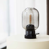 502120_Normann_Copenhagen_Amp_Table_Lamp_Smoke_Black_03.jpg