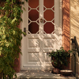 FermLiving_SS26_OrrithDoorKnocker_1104273180_HourglassPot_1104272164_VeiOutdoorCandle_1104272985_1104272984 (1).jpg