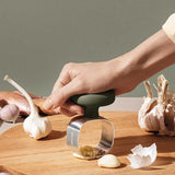 531504-green-tool-garlic-masher-1-1920x886.jpg