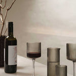 fermLIVING_AW24_RippleMilkJug_SmokedGrey_1104270136_RippleRedWineGlasses_SetOf2_SmokedGrey_1104270092.jpg