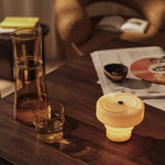 FermLiving_SS26_AturaDiningTable_1104273617_1104273616_RipplePortableLamp_1104272783_BoyaCarafe_1104272741.jpg