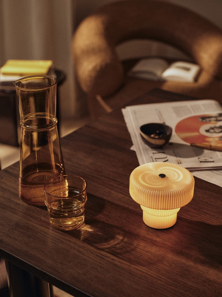 FermLiving_SS26_AturaDiningTable_1104273617_1104273616_RipplePortableLamp_1104272783_BoyaCarafe_1104272741.jpg